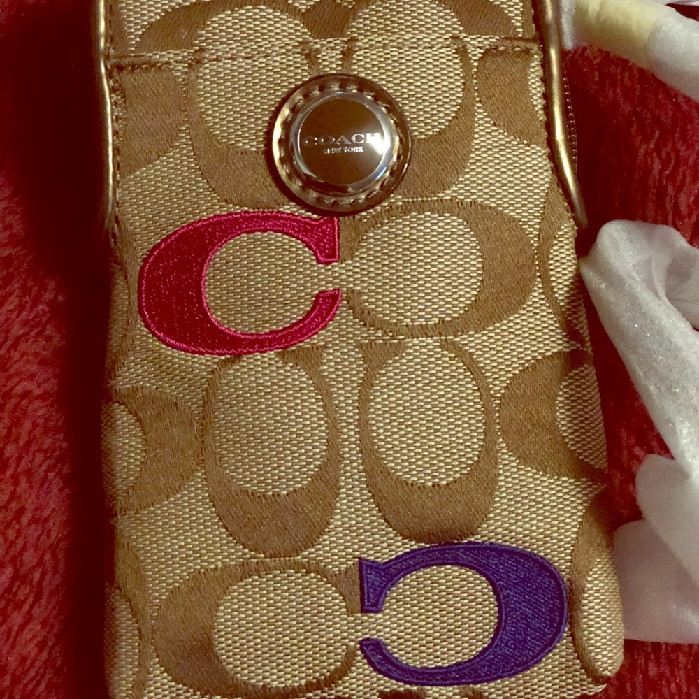 Coach Multi wristlet.